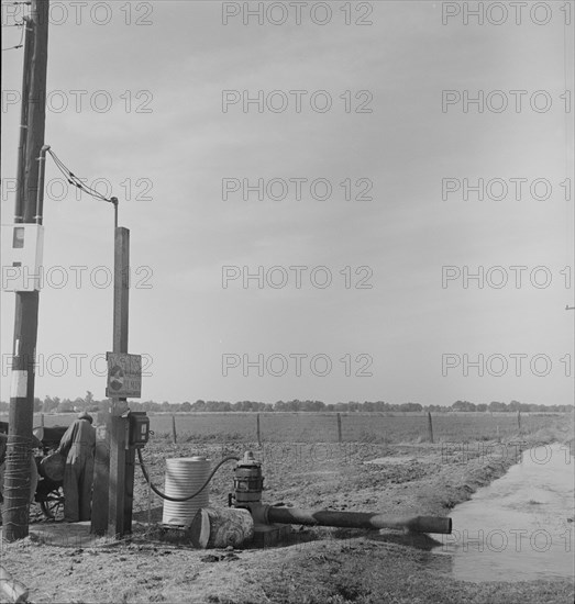 Irrigation pump on edge of field, San Joaquin Valley, California, 1938. Creator: Dorothea Lange.