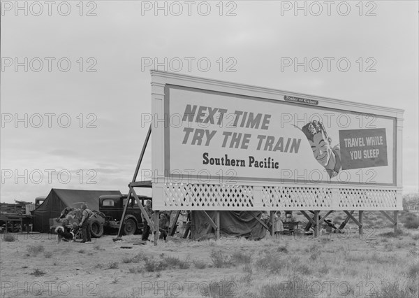 Three families camped on the plains along US 99 in California, 1938. Creator: Dorothea Lange.