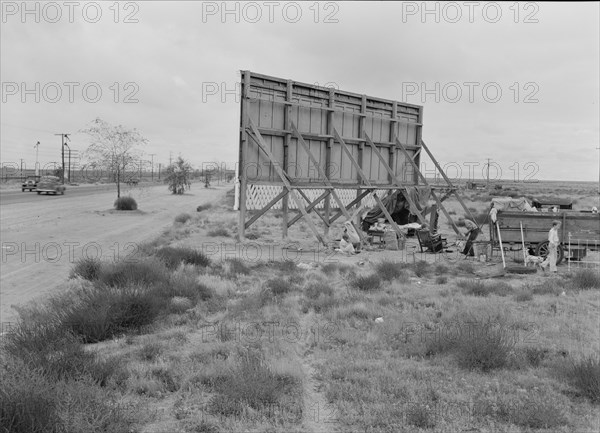 Three families camped on the plains along US 99 in California, 1938. Creator: Dorothea Lange.