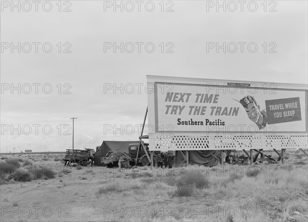 Three families camped on the plains along US 99 in California, 1938. Creator: Dorothea Lange.