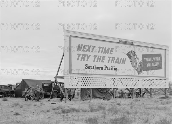 Three families camped on the plains along US 99 in California, 1938. Creator: Dorothea Lange.