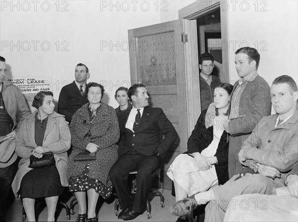 Night meeting in the FSA office, Tulare County, California, 1938. Creator: Dorothea Lange.