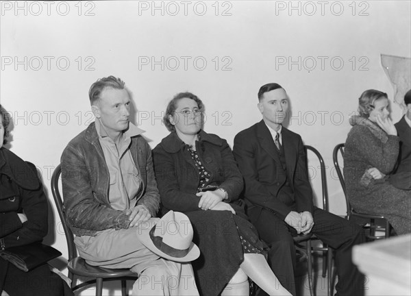 Night meeting in the FSA office, Tulare County, California, 1938. Creator: Dorothea Lange.