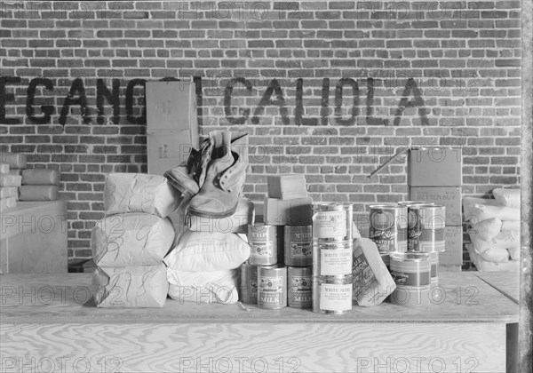 Farm Security Administration (FSA) distributing station, Bakersfield, California, 1938. Creator: Dorothea Lange.