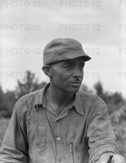 Member of the Delta cooperative farm at Hillhouse, Mississippi, 1937. Creator: Dorothea Lange.