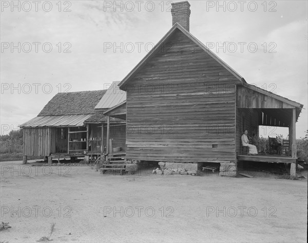 Home of farmer who has raised cotton for fifty years on his own land, Greene County, Georgia, 1937. Creator: Dorothea Lange.