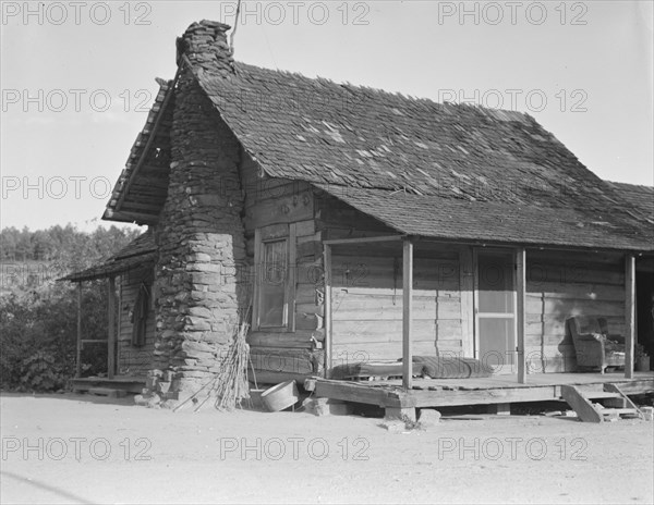 House occupied by sharecropper family for seven years, Near Hartwell, Georgia, 1937. Creator: Dorothea Lange.