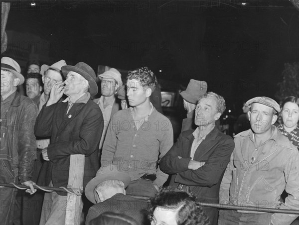 Street meeting at night...outside of Shafter, California, 1938. Creator: Dorothea Lange.