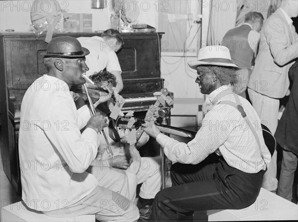 Halloween party at Shafter camp for migrants, California, 1938. Creator: Dorothea Lange.