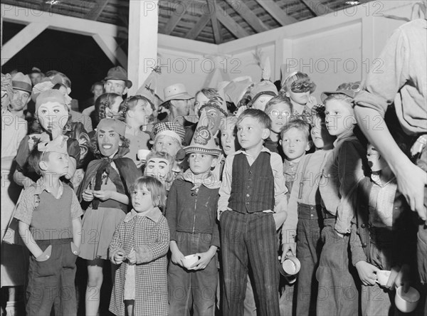 Halloween party at Shafter migrant camp, California, 1938. Creator: Dorothea Lange.