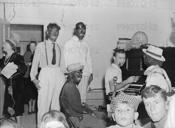 Halloween party, Shafter, California, 1938. Creator: Dorothea Lange.