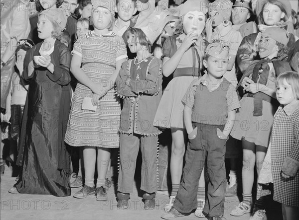 Halloween party at Shafter migrant camp, California, 1938. Creator: Dorothea Lange.