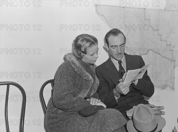 Night meeting in the FSA office, Visalia, Tulare County, California, 1938. Creator: Dorothea Lange.