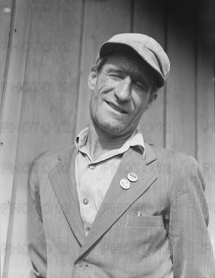 Ex-Oklahoma farmer, one of the leaders in the strike of cotton pickers, Kern County, CA, 1938. Creator: Dorothea Lange.