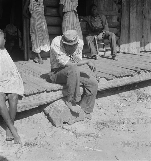 The sharecropper harvest is over in tobacco, near Tifton, Georgia, 1938. Creator: Dorothea Lange.