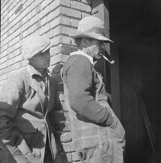 Warehouse used as distributing office for FSA relief grants, Bakersfield, California, 1938. Creator: Dorothea Lange.