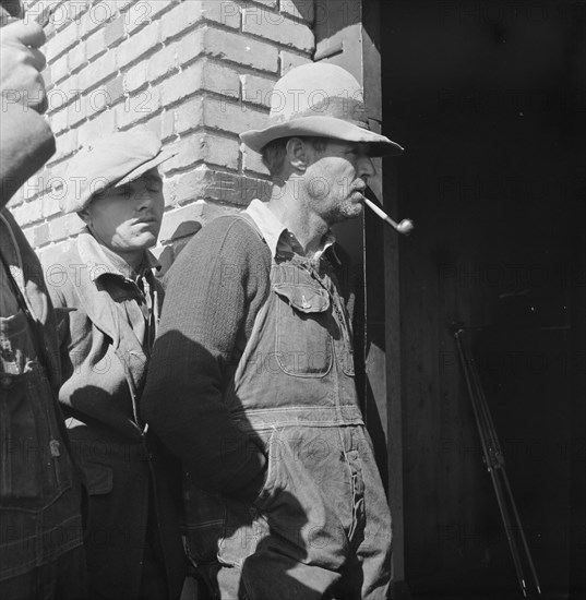 Warehouse used as distributing office for FSA relief grants, Bakersfield, CA, 1938. Creator: Dorothea Lange.