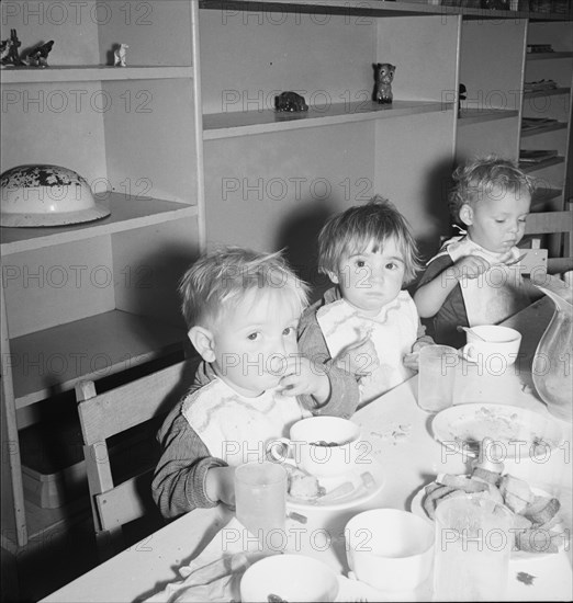 Lunchtime for young migrants at Shafter Camp, California, 1939. Creator: Dorothea Lange.