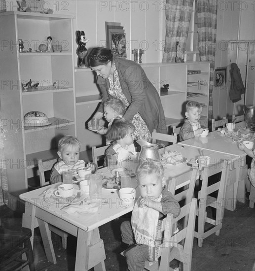 Lunchtime for young migrants at Shafter Camp, California, 1939. Creator: Dorothea Lange.