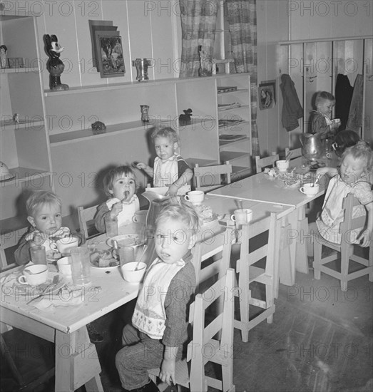 Lunchtime for young migrants at Shafter Camp, California, 1939. Creator: Dorothea Lange.