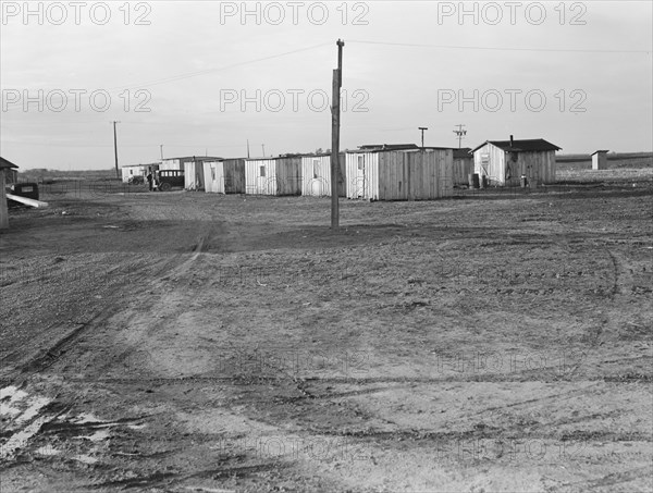 Farm Security Administration (FSA) temporary camp for migrants, Gridley, California, 1939. Creator: Dorothea Lange.