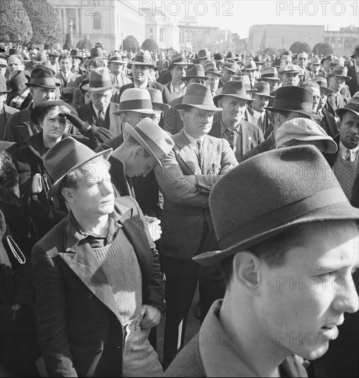 Listening to speeches at mass meeting of WPA workers protesting..., San Francisco, California, 1939. Creator: Dorothea Lange.