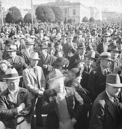 Listening to speeches at mass meeting of WPA workers protesting..., San Francisco, California, 1939. Creator: Dorothea Lange.