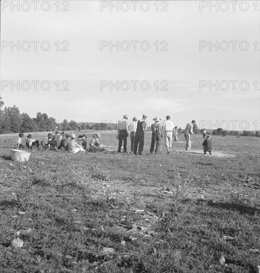 Farmers' baseball game in the country, on U.S. 62, near Mountain Home, northern Arkansas, 1938. Creator: Dorothea Lange.