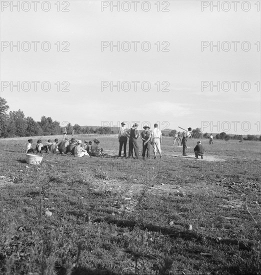 Farmers' baseball game in the country, on U.S. 62, near Mountain Home, northern Arkansas, 1938. Creator: Dorothea Lange.