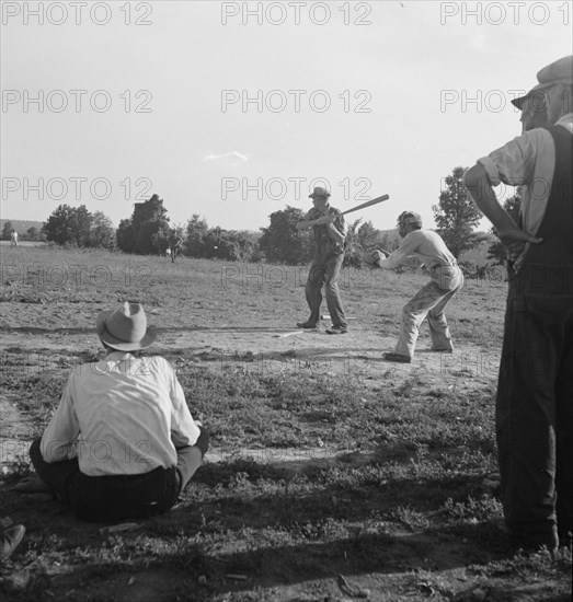 Farmers' baseball game in the country, on U.S. 62, near Mountain Home, northern Arkansas, 1938. Creator: Dorothea Lange.