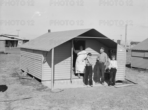 Migrant family from Oklahoma, first occupants of Westley camp, California, 1939. Creator: Dorothea Lange.