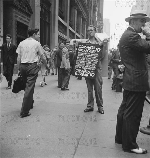 Street hawker selling Consumer's..., 42nd Street and Madison Avenue, New York City, 1939. Creator: Dorothea Lange.