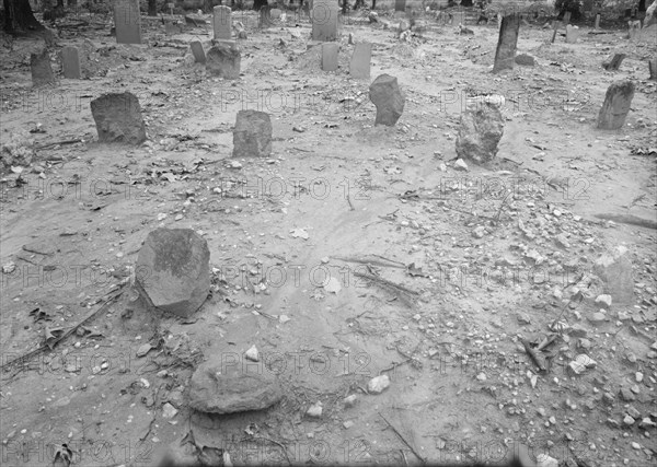 A red clay Negro cemetery, Bethel Hill High School, Person County, North Carolina, 1939. Creator: Dorothea Lange.