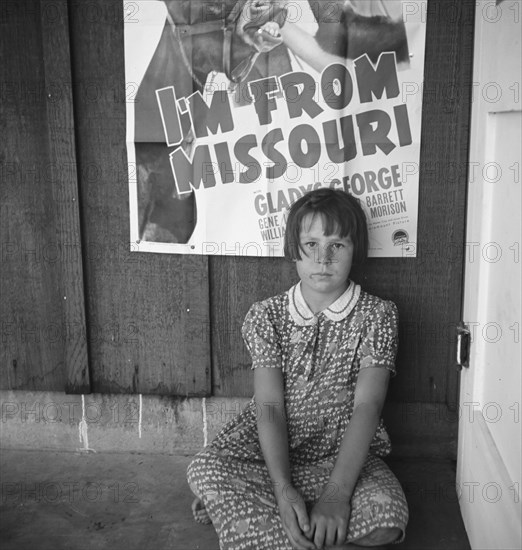 Advertisement for current movie in town, Westley, California, 1939. Creator: Dorothea Lange.