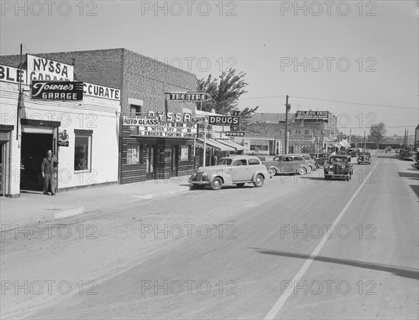 Saturday afternoon, main street of Nyssa, Oregon, 1939. Creator: Dorothea Lange.