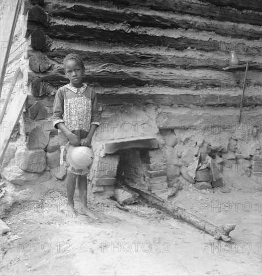 Possibly: Grandchildren of tobacco sharecropper down at barns, Wake County, North Carolina, 1939. Creator: Dorothea Lange.