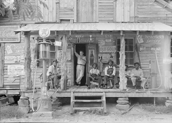 Country store on dirt road, Sunday afternoon, Gordonton, North Carolina, 1939. Creator: Dorothea Lange.