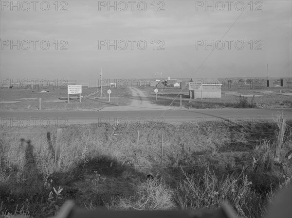 Entrance to Nyssa Farm family labor camp, FSA mobile unit...1, Near Nyssa, Oregon, 1939. Creator: Dorothea Lange.