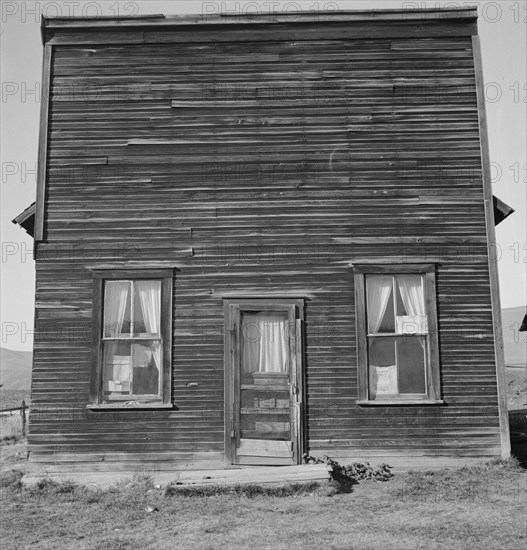 Member of Ola self help sawmill co-op..., "Jacknife Saloon", Gem County, Idaho, 1939. Creator: Dorothea Lange.