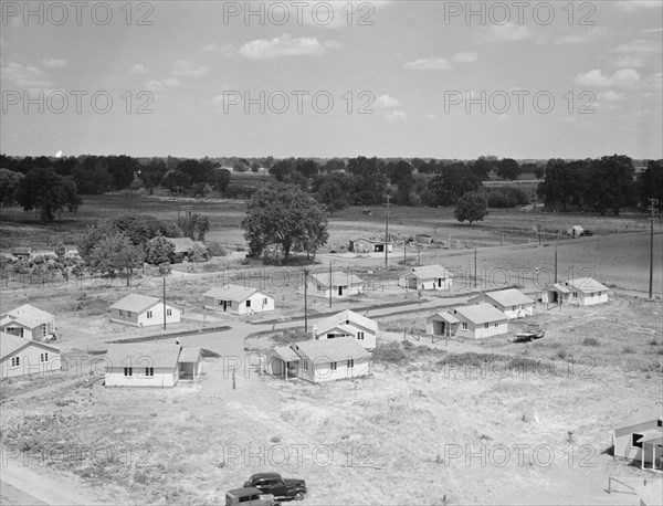 Partially completed homes for agricultural workers..., Farmersville, California, 1939. Creator: Dorothea Lange.