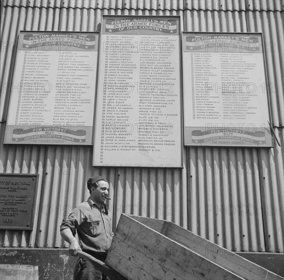 Many of the Fulton fish market men are in the armed forces, New York, 1943. Creator: Gordon Parks.