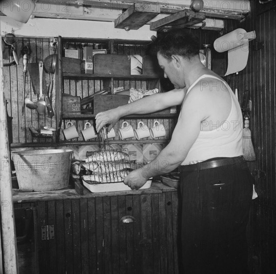 On board the Alden out of Gloucester, Massachusetts, 1943. Creator: Gordon Parks.