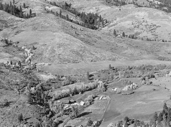 Possibly: Looking down on Ola self-help co-op mill showing the upper end..., Gem County, Idaho, 1939 Creator: Dorothea Lange.