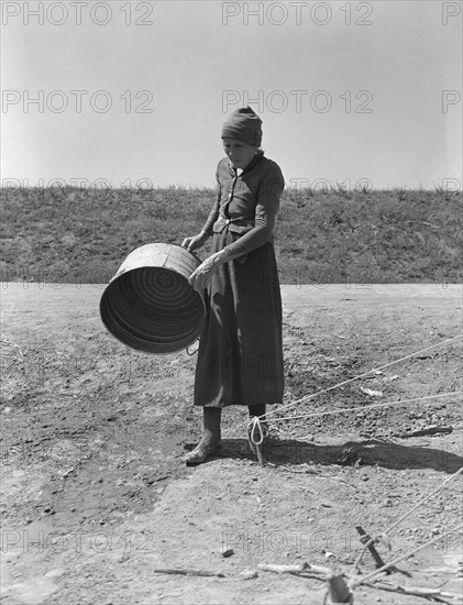 A grandmother in a migrant camp, Stanislaus County, California, 1939. Creator: Dorothea Lange.
