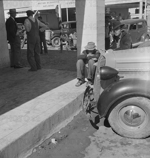 Outside FSA grant office during the pea harvest, Calipatria, California, 1939. Creator: Dorothea Lange.