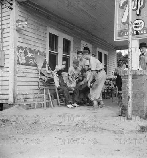 Rural filling station becomes community center..., near Chapel Hill, North Carolina, 1939. Creator: Dorothea Lange.