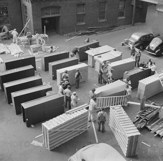 Possibly: United States government workers and carpenters making crates..., Washington, D.C., 1942. Creator: Gordon Parks.