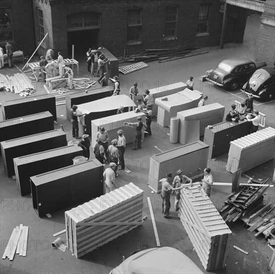 Possibly: United States government workers and carpenters making crates..., Washington, D.C., 1942. Creator: Gordon Parks.