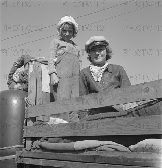 Part of family come for work in potatoes, Tulelake, Siskiyou County, California, 1939. Creator: Dorothea Lange.