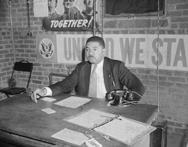 Air raid wardens' meeting in zone nine, Southwest area, Washington, D.C, 1942. Creator: Gordon Parks.